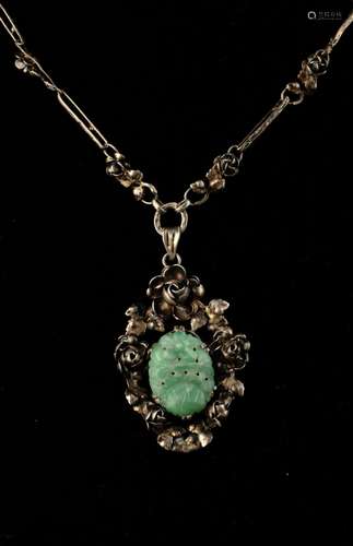 A German silver mounted jadeite pendant necklace.