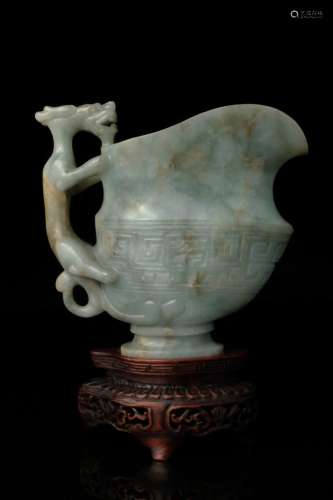 A Jadeite archaistic ewer form vase, Qing Dynasty