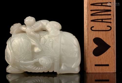 A white jade 'Boy and Elephant' group, 18th c.,