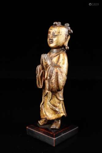 A gilt bronze figure of Ananda, Ming dynasty,