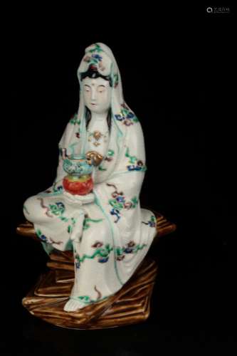 A molded and polychrome figure of Guanyin 20th