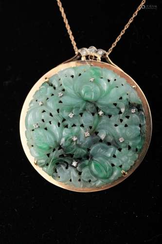 A gold and diamond mounted jadeite pendant Qing