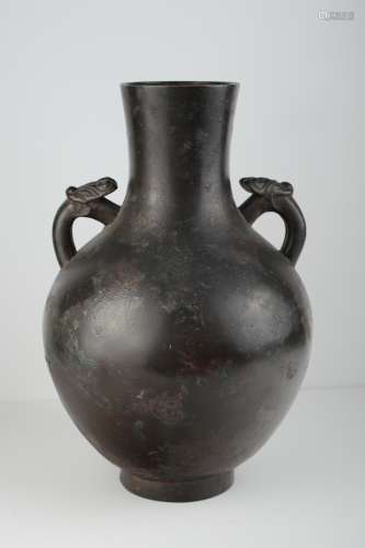 A large late Ming - Early Qing bronze vase,