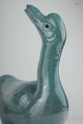 A turquoise glaze figure of a standing duck,