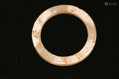 A Chinese Carved Jade Ring