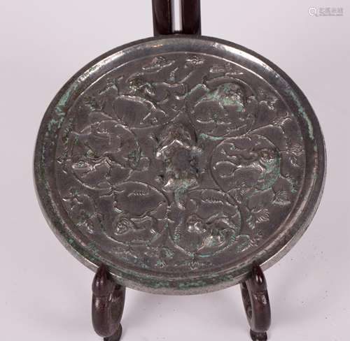 CHINESE CIRCULAR BRONZE MIRROR, BEAST & GRAPEVINE