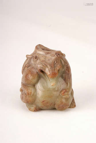 A Chinese Jade Carved Foo-Dog