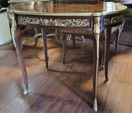 FRENCH ALL AROUND ORMOLU CENTER TABLE