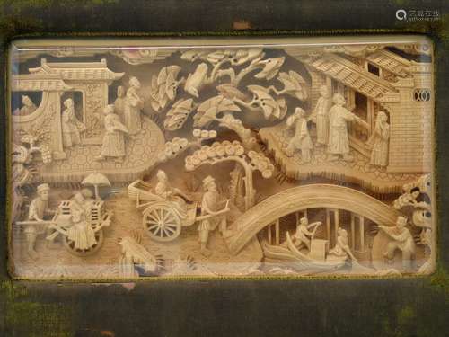 Framed Chinese wood carving.