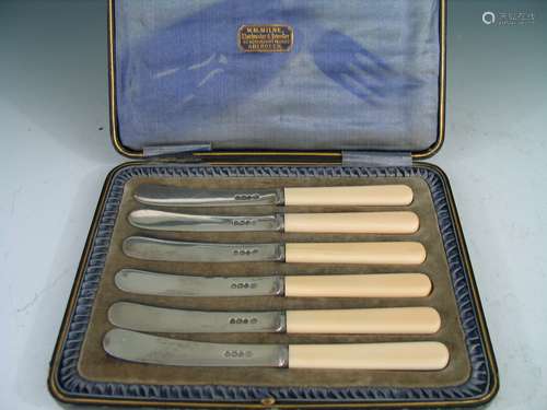 Set of Sterling silver butter knives.