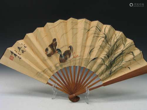 Chinese water color painting and calligraphy on fan.