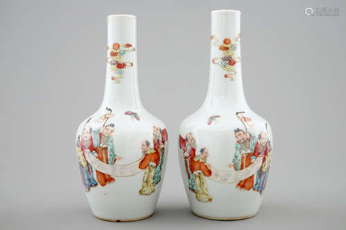 A pair of Chinese famille rose bottle vases, 19th C.