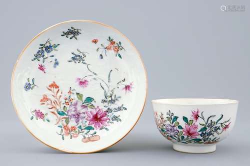 A Chinese clobbered blanc de chine cup and saucer with moulded dragon design, 18th C.