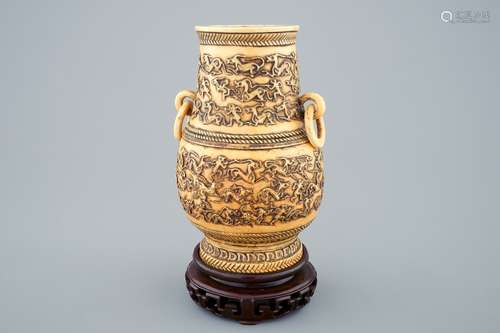 A Chinese carved ivory hu vase on wooden stand, 19th C.