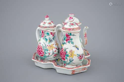 A set of 3 Chinese floral famille rose jugs on stand, Yongzheng, 1723-1735