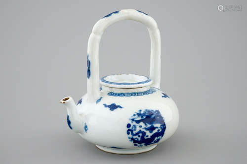 A Chinese blue and white high-handled dragons teapot, Kangxi