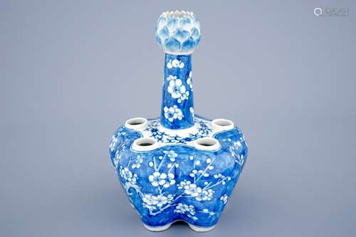 A Chinese blue and white tulip vase with prunus design, 19th C.