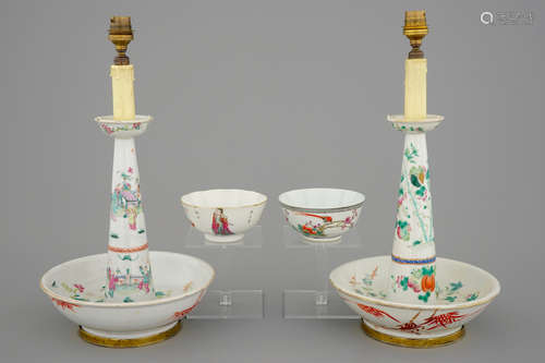 Two Chinese famille rose bowls and two candlesticks, 19th C.