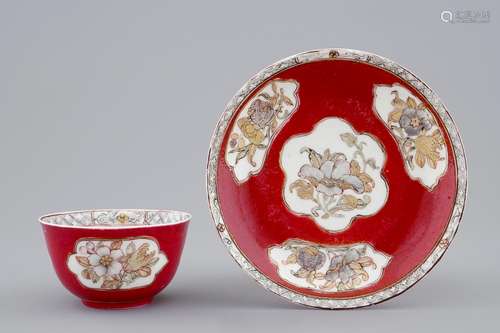 A Chinese eggshell ruby ground cup and saucer, Yongzheng, 1723-1735