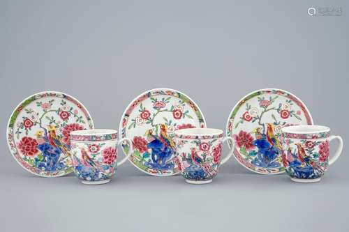 A set of three Chinese famille rose cups and saucers with bords among flowers, Yongzheng/Qianlong