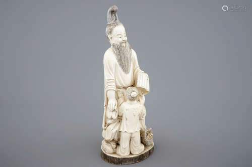 A Chinese carved ivory group of a sage with a child, 19th C.