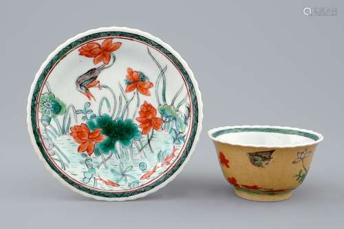 A Chinese famille verte and café au lait cup and saucer, Kangxi