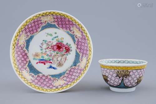 A Chinese famille eggshell rose cup and saucer with a central flowervase, Yongzheng, 1723-1735