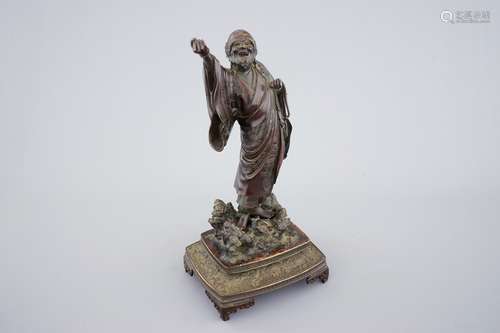 A fine Japanese bronze figure of a sage on base, Meiji, 19th C.