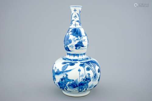 A Chinese blue and white double gourd vase, Transitional period, 1620-1683