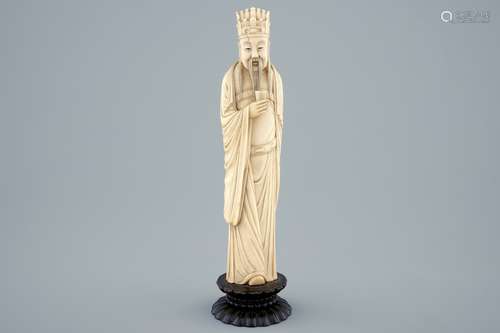 A Chinese carved ivory figure of a sage with a beaker on a lotus-shaped base, 19th C.