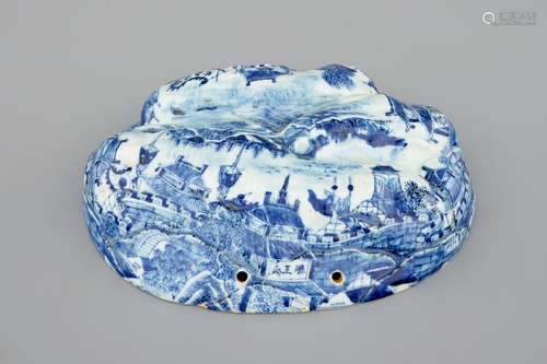 An unusual blue and white Chinese porcelain walnut-shaped hanging ornament or lid, 18th C.