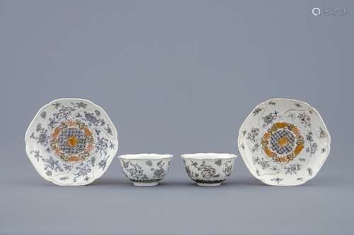 A pair of Chinese grisaille and gilt cups and saucers with insects among fruits and flowers, Yongzheng, 1723-1735