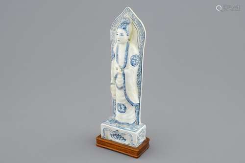 A Chinese blue and white figure of Guanyin on a base, the back inscribed, probably Wanli, Ming Dynasty