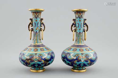 A pair of small Chinese cloisonné bottle-shaped vases, 18/19th C.