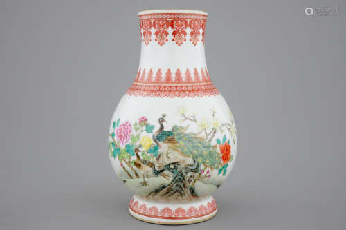 A Chinese Republic famille rose vase with a peacock, 20th C.