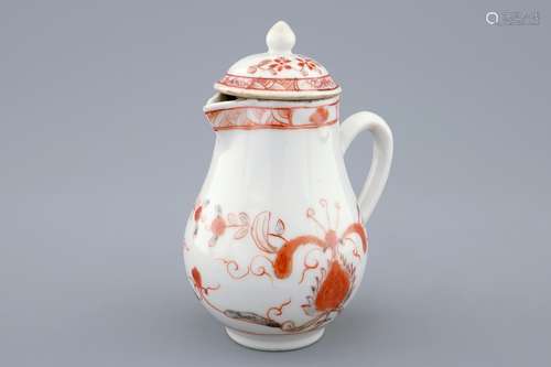 A Chinese iron red and grisaille milk jug and cover, Qianlong, 18th C.