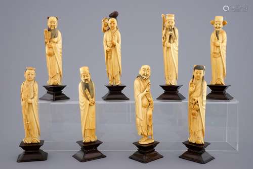 A set of 8 fine Chinese carved ivory immortals on wooden bases, 19th C.