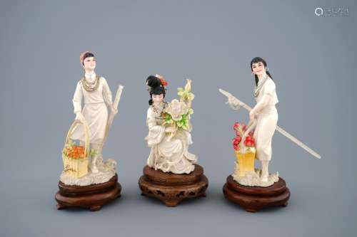 A set of 3 Chinese polychrome ivory figures of women on wooden base, 2nd quarter 20th C.