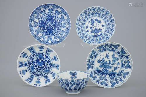 Three Chinese blue and white plates and a lotus shaped cup and saucer, Kangxi