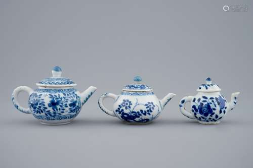 Three Chinese blue and white miniature teapots and covers, Kangxi