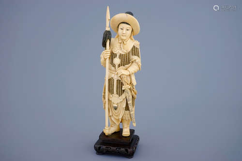 A Chinese carved ivory figure of a female warrior on a wooden base, late 19th C.