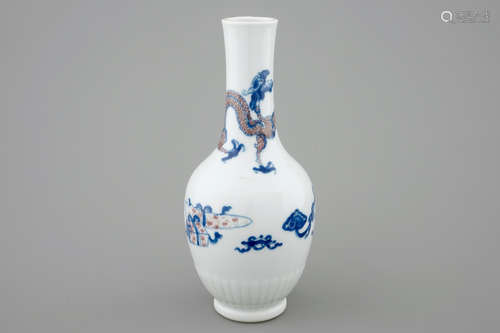 A Chinese blue and white and underglaze red vase with a dragon, Kangxi