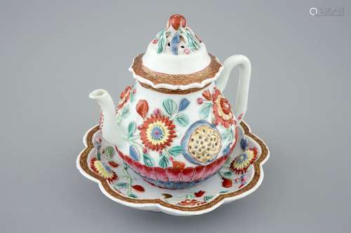 A Chinese moulded and applied famille rose teapot and cover on stand, Yongzheng, 1723-1735