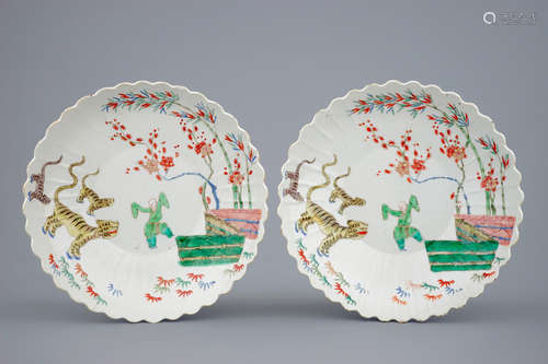 A pair of Chinese famille verte Kakiemon style plates, Kangxi, 1st quarter 18th C.