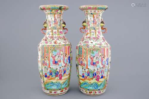 An excellent pair of Chinese Canton famille rose vases with duck handles, 19th C.