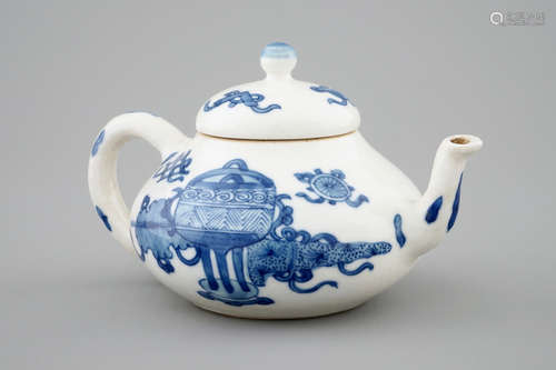 A blue and white Chinese soft paste porcelain miniature teapot, Kangxi