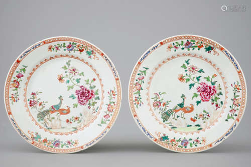 A pair of Chinese famille rose plates with peacocks, 18th C.