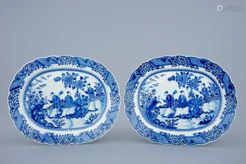 A pair of large oval blue and white Chinese dishes with ladies in a garden, Qianlong, 18th C.