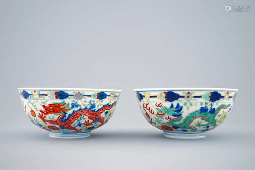 A pair of Chinese wucai dragon and phoenix bowls, Guangxu mark and of the period