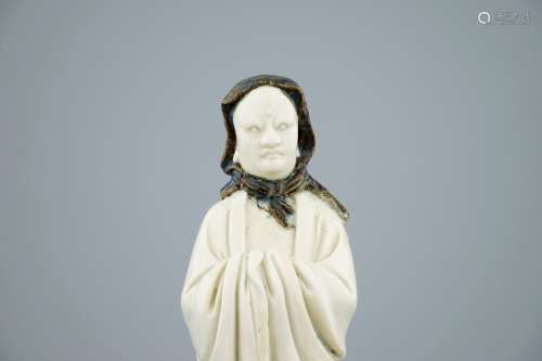 An unusual Chinese Dehua blanc de Chine figure of a black-scarved Luohan, 19th C.